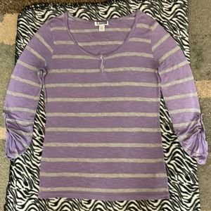 Vintage ROXY shirt with versatile length sleeves. 1/4 button up front. Size Med.